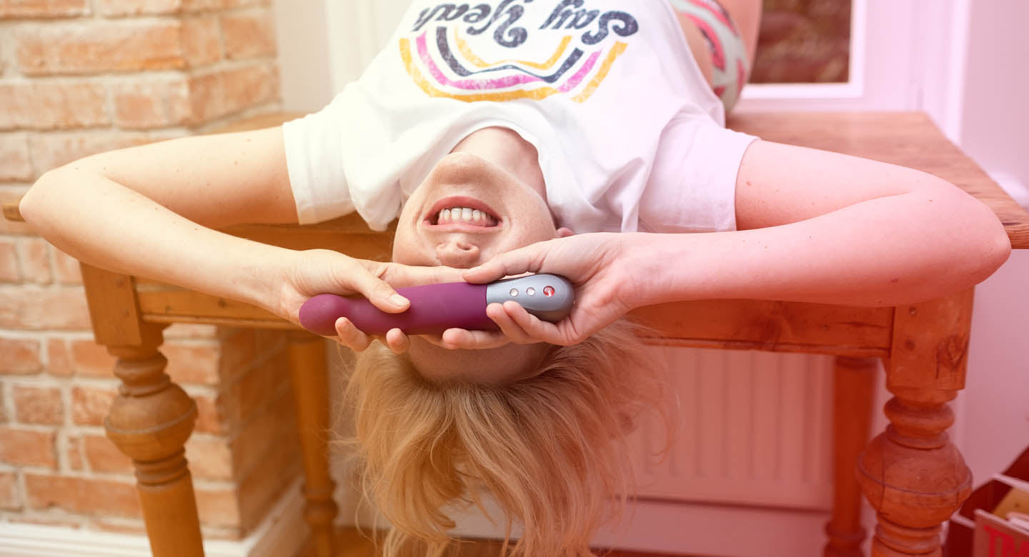 A girl holding Stronic G Pulsator