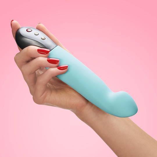 Woman's hand holding Fun Factory's Stronic G g-spot pulsator