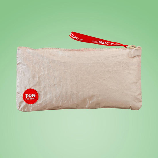 Fun Factory's toy bag on a green background